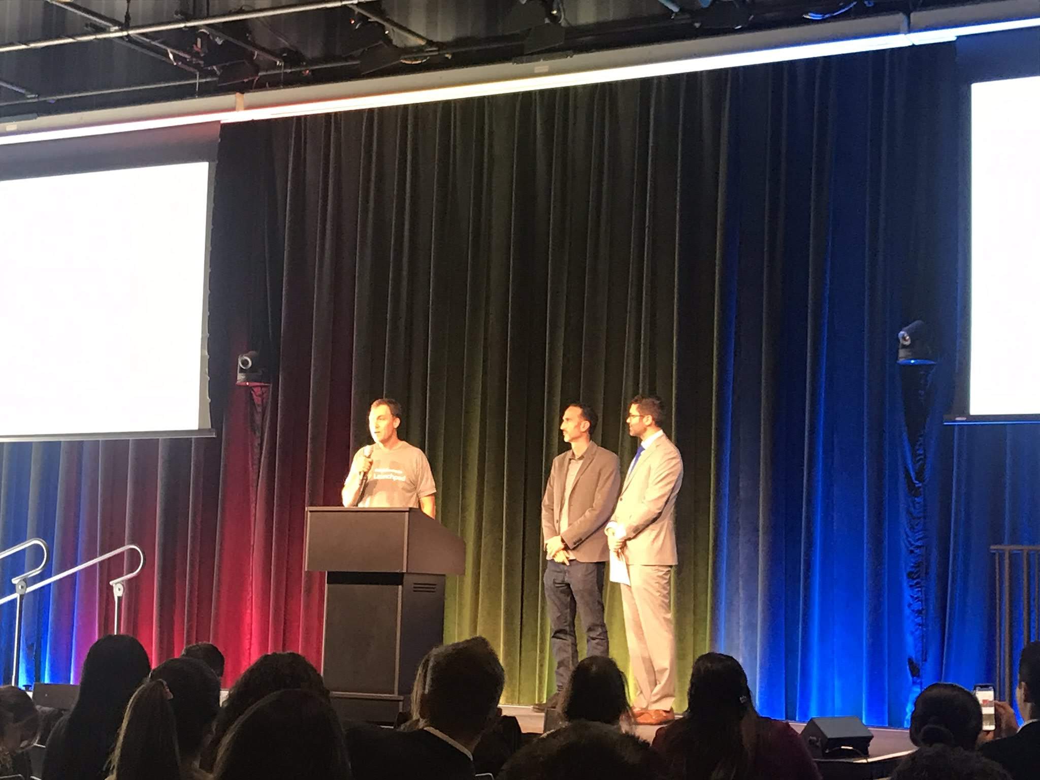 Closing speakers on the symposium stage